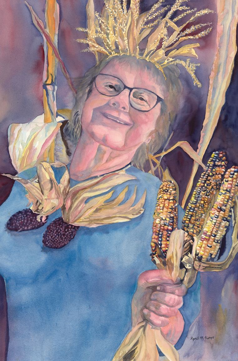 Watermedia painting by A. Rimpo, a portrait of a smiling woman in glasses wearing a crown and necklace made of corn, holding multicolored corn cobs.